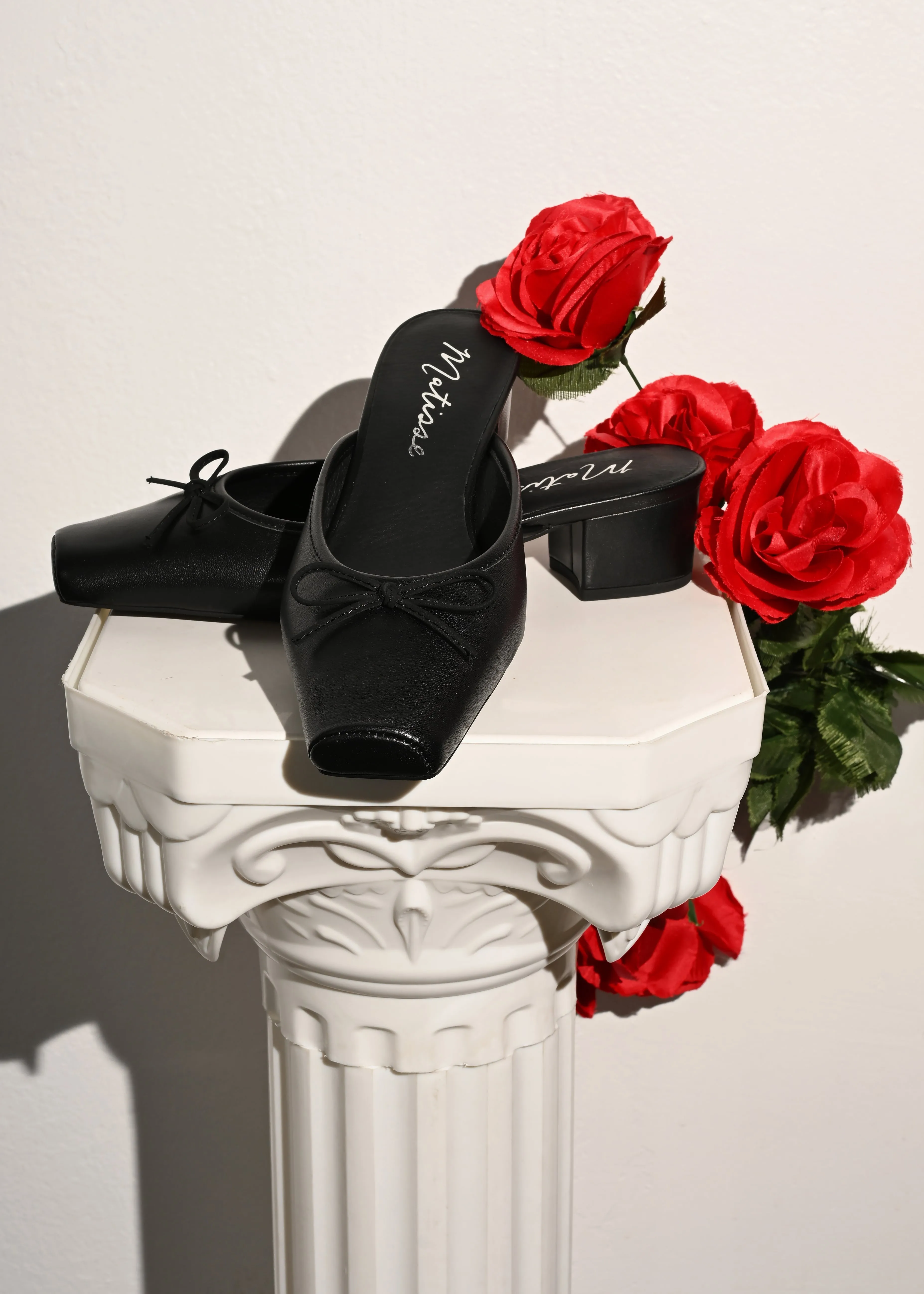 Basilio Heeled Mule - Black Recycled Material Components Iconic look