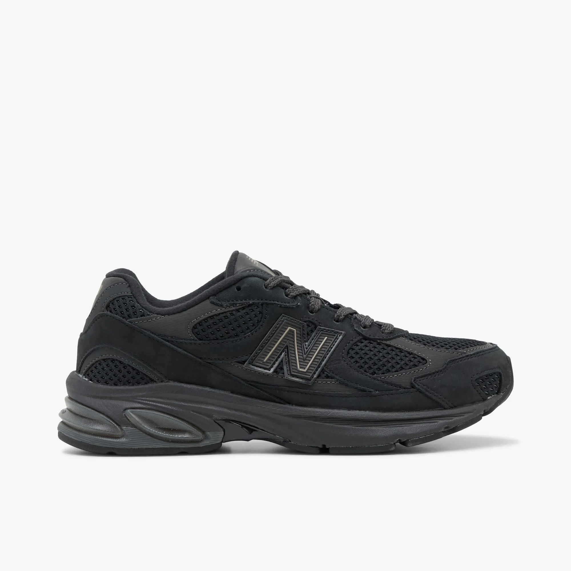 New Balance 2010 Black / Black Cement Sleek Shape